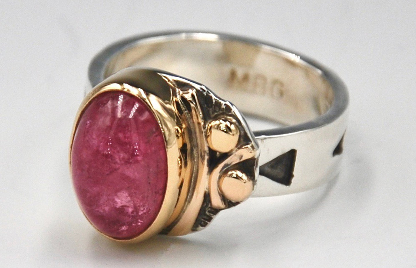 Kazakhstan Pink Tourmaline set in 18k Gold with 14k and 18k Gold Accents on a Silver Band
