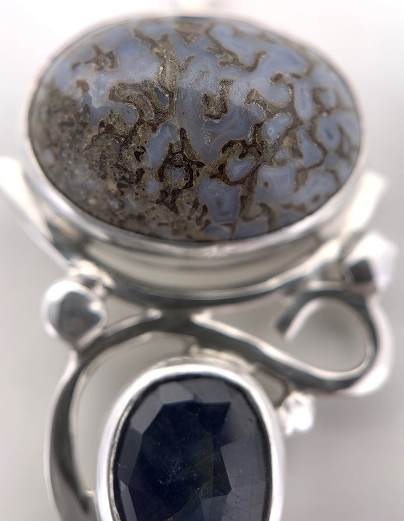 Dinosaur Bone and Sapphire Silver Pendant